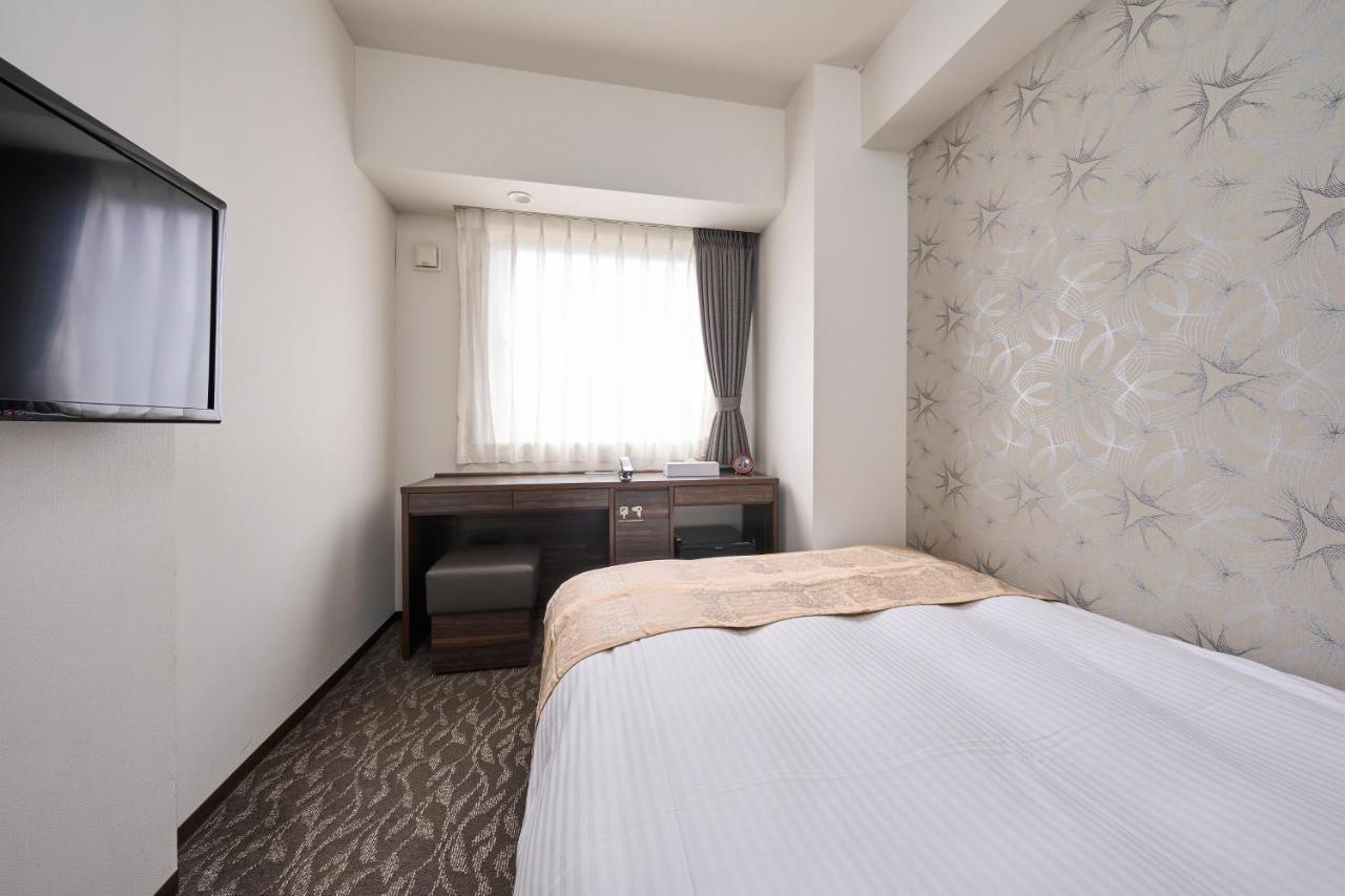 Hotel Axia Inn Sapporo Susukino Bagian luar foto