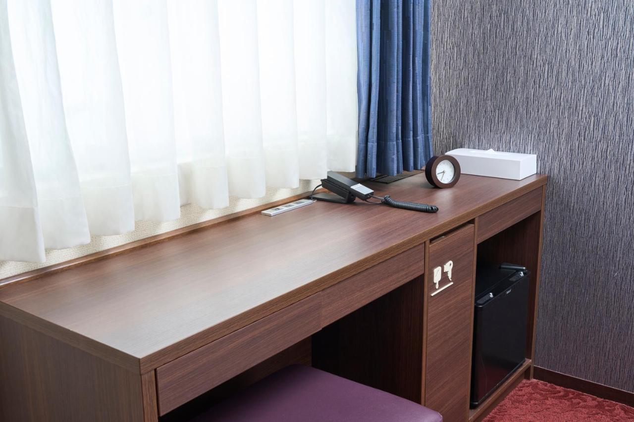 Hotel Axia Inn Sapporo Susukino Bagian luar foto