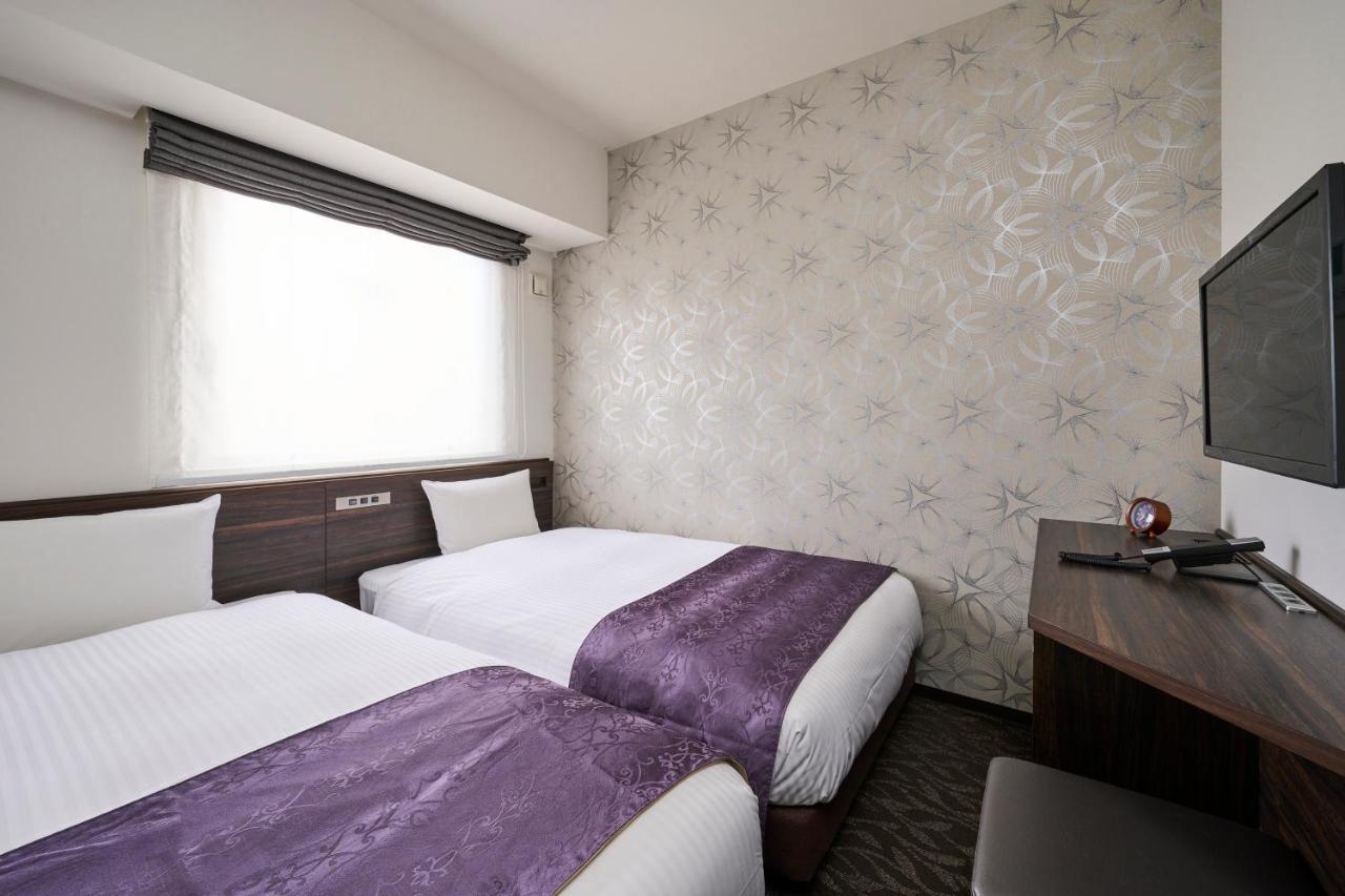 Hotel Axia Inn Sapporo Susukino Bagian luar foto